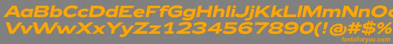 フォントZeppelin42BoldItalic – オレンジの文字は灰色の背景にあります。