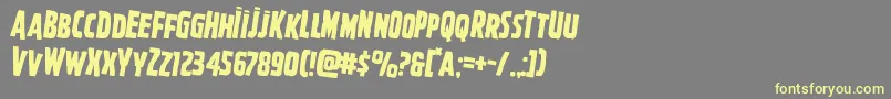 Ghoulishintentrotate2-Schriftart – Gelbe Schriften auf grauem Hintergrund