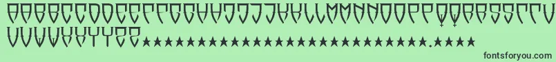 フォントReubalach – 緑の背景に黒い文字