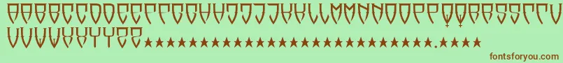 フォントReubalach – 緑の背景に茶色のフォント