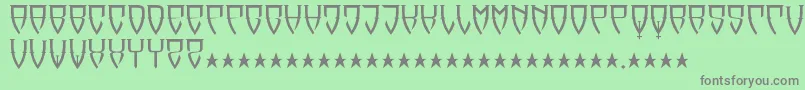 フォントReubalach – 緑の背景に灰色の文字