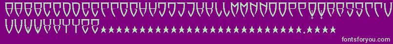 フォントReubalach – 紫の背景に緑のフォント