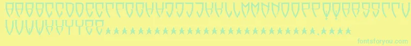 フォントReubalach – 黄色い背景に緑の文字