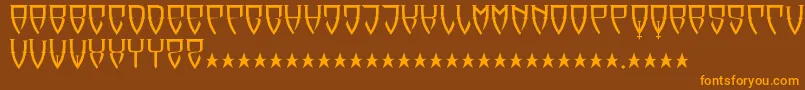 フォントReubalach – オレンジ色の文字が茶色の背景にあります。