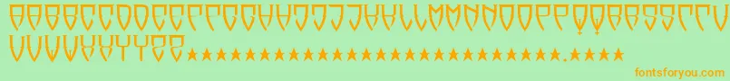 フォントReubalach – オレンジの文字が緑の背景にあります。