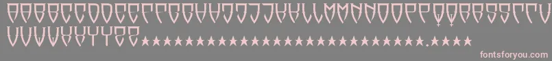 フォントReubalach – 灰色の背景にピンクのフォント