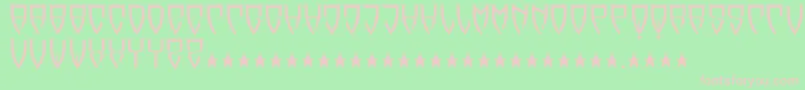 Reubalach-fontti – vaaleanpunaiset fontit vihreällä taustalla