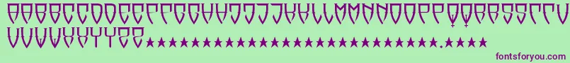 フォントReubalach – 緑の背景に紫のフォント