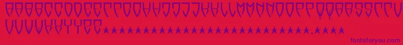 フォントReubalach – 赤い背景に紫のフォント