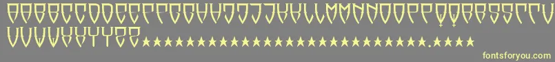 Reubalach-fontti – keltaiset fontit harmaalla taustalla