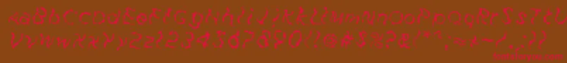 FuzzfaceRegular Font – Red Fonts on Brown Background