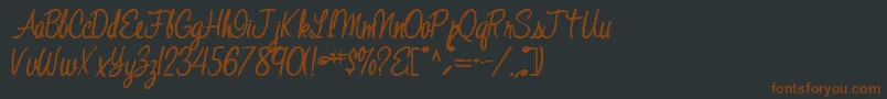 Jelindafont52Bold-fontti – ruskeat fontit mustalla taustalla
