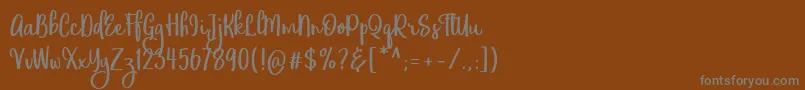 フォントEufoniemTwo – 茶色の背景に灰色の文字