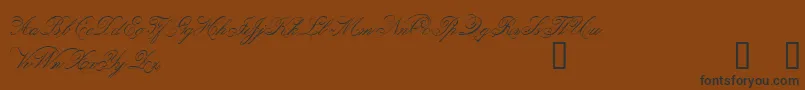 Belphebe-Schriftart – Schwarze Schriften auf braunem Hintergrund