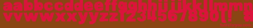 DjbBellyButtonInnie-Schriftart – Rote Schriften auf braunem Hintergrund