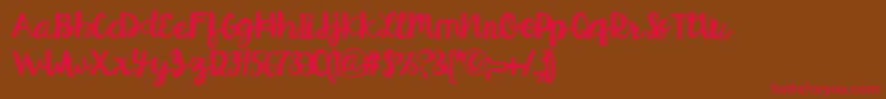 HelloEsliScript Font – Red Fonts on Brown Background