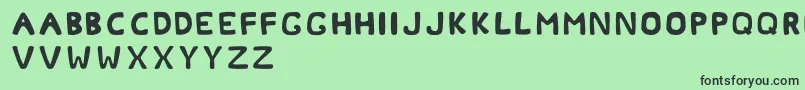 Okcoral Font – Black Fonts on Green Background