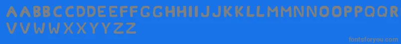 Okcoral Font – Gray Fonts on Blue Background