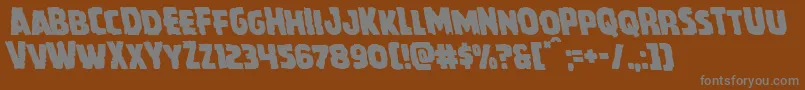 Howlinmadleft-Schriftart – Graue Schriften auf braunem Hintergrund