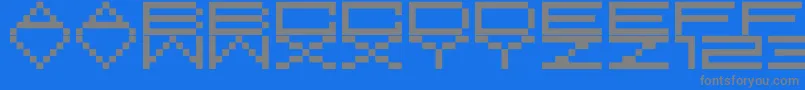 フォントM37FeelTheBit – 青い背景に灰色の文字