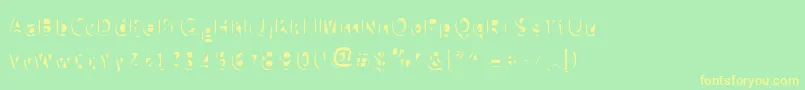 フォントSlushfaux ffy – 黄色の文字が緑の背景にあります
