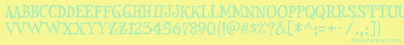 SnidelyRegular Font – Green Fonts on Yellow Background