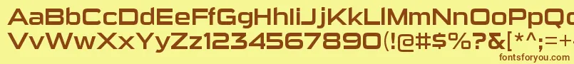 フォントSuigenerisrgRegular – 茶色の文字が黄色の背景にあります。