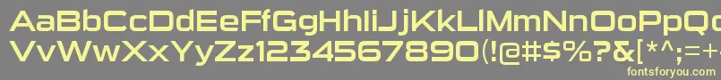 Шрифт SuigenerisrgRegular – жёлтые шрифты на сером фоне
