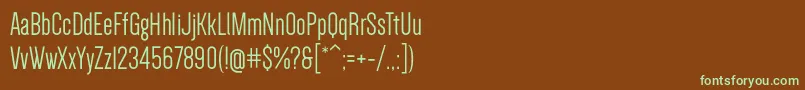 フォントDenseRegular – 緑色の文字が茶色の背景にあります。
