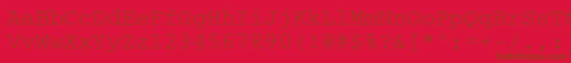 Czcionka Couriercyrillic – brązowe czcionki na czerwonym tle