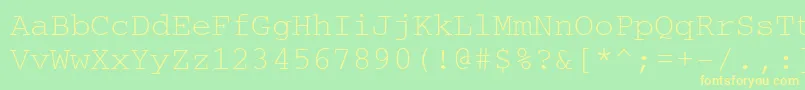 フォントCouriercyrillic – 黄色の文字が緑の背景にあります