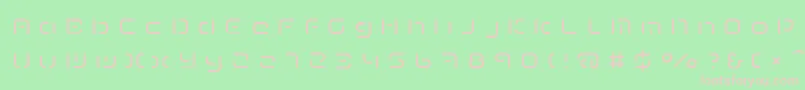 TermRegeee-fontti – vaaleanpunaiset fontit vihreällä taustalla
