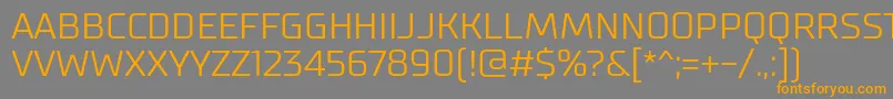 SupermolotLight-Schriftart – Orangefarbene Schriften auf grauem Hintergrund