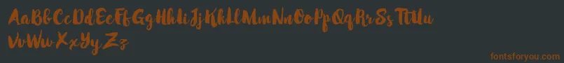 Шрифт MabotimDemo – коричневые шрифты на чёрном фоне