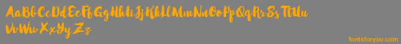 フォントMabotimDemo – オレンジの文字は灰色の背景にあります。