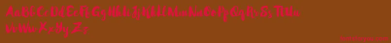 フォントMabotimDemo – 赤い文字が茶色の背景にあります。