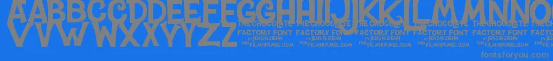 CharlieTheChocolateFactory-Schriftart – Graue Schriften auf blauem Hintergrund