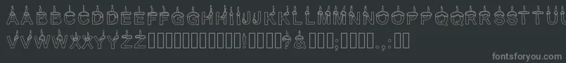 Timetoparty-fontti – harmaat kirjasimet mustalla taustalla