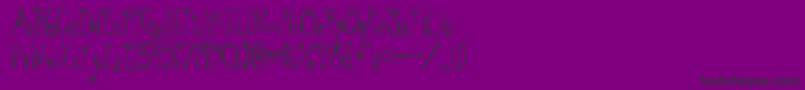 フォントGreywolfQuirk – 紫の背景に黒い文字