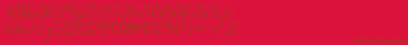GreywolfQuirk Font – Brown Fonts on Red Background