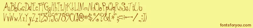 GreywolfQuirk Font – Brown Fonts on Yellow Background