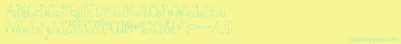 フォントGreywolfQuirk – 黄色い背景に緑の文字