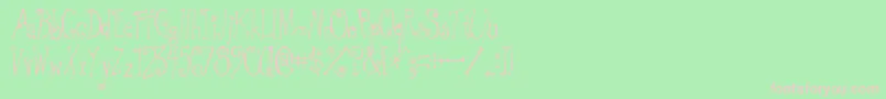 GreywolfQuirk-fontti – vaaleanpunaiset fontit vihreällä taustalla