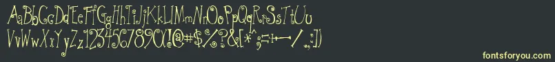 GreywolfQuirk Font – Yellow Fonts on Black Background