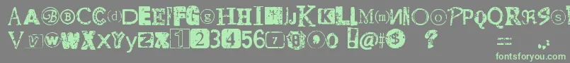 DistressedRansomNote Font – Green Fonts on Gray Background