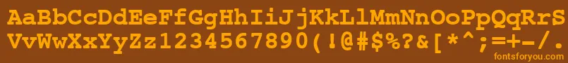 フォントNtcouriervkCyrillicBold – オレンジ色の文字が茶色の背景にあります。