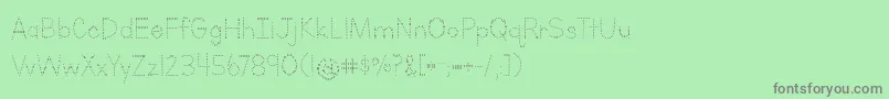 BmdLettersForLearnersDotsHattedJ Font – Gray Fonts on Green Background