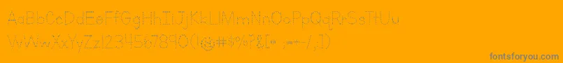 Police BmdLettersForLearnersDotsHattedJ – polices grises sur fond orange