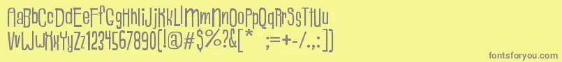 フォントBorlogs – 黄色の背景に灰色の文字