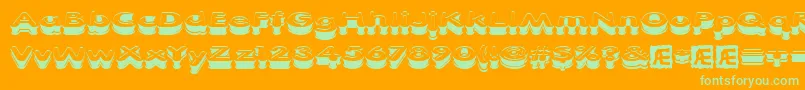 Xtrusion Font – Green Fonts on Orange Background